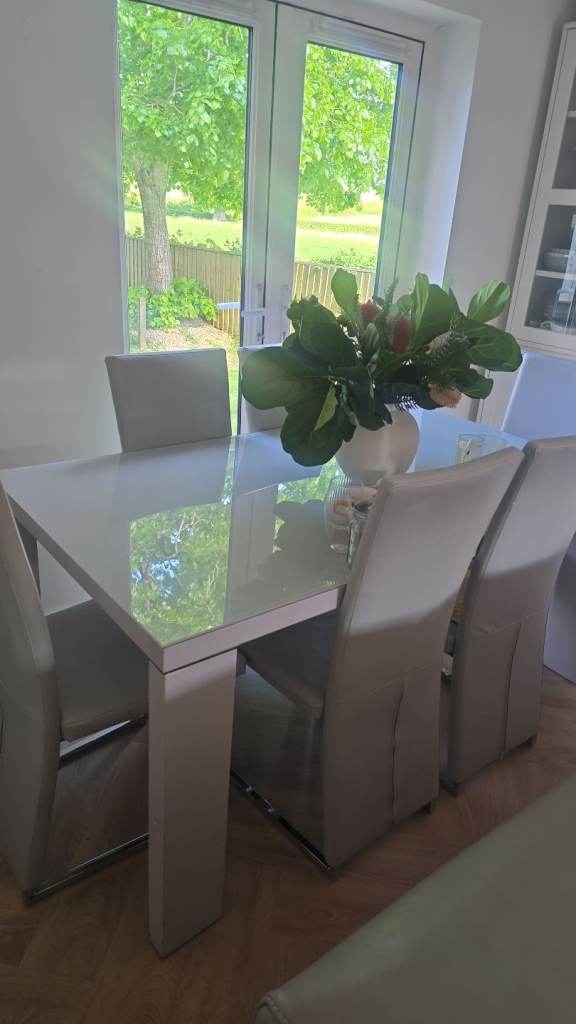 6 seater glass top dining table