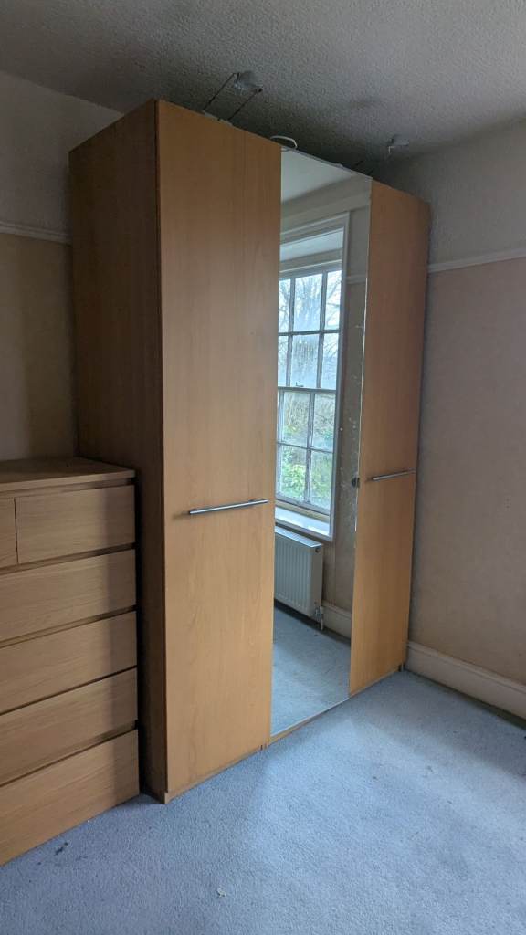 Triple IKEA Pax Wardrobe with Komplement interior fittings