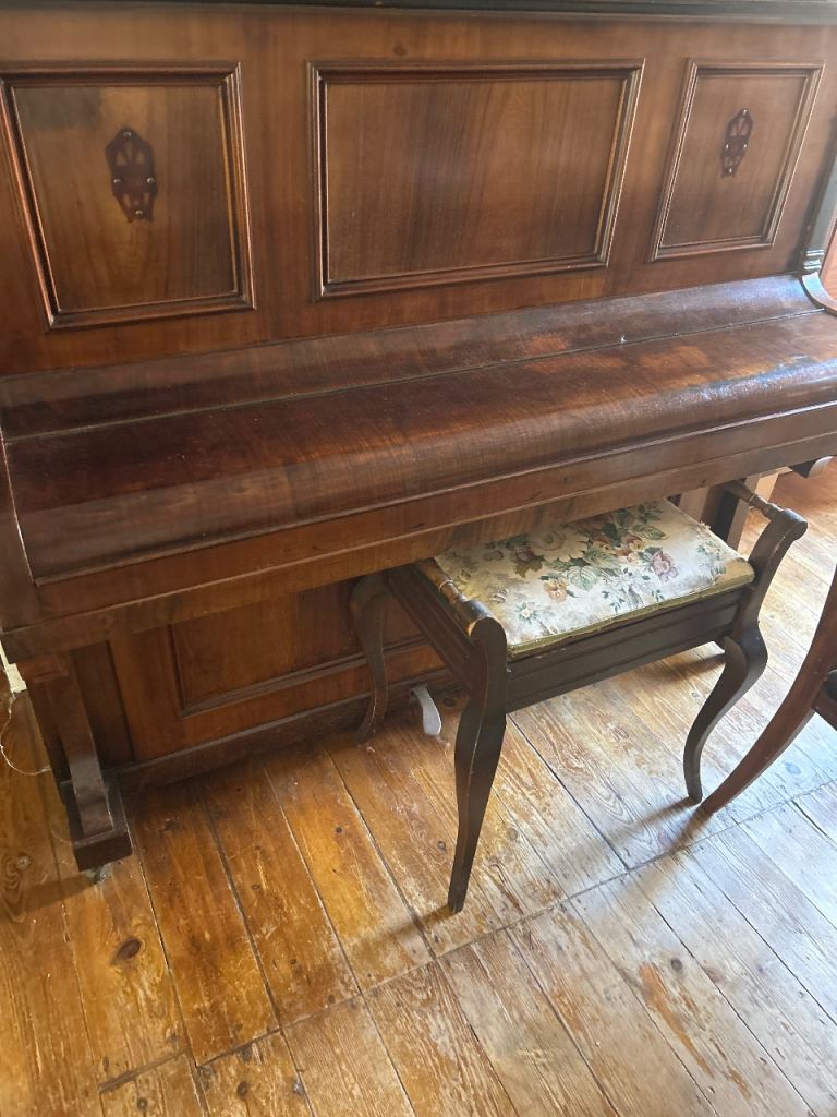 100 year old wooden piano w/ivory keys