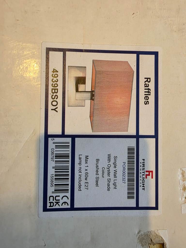 single wall light with oyster shade