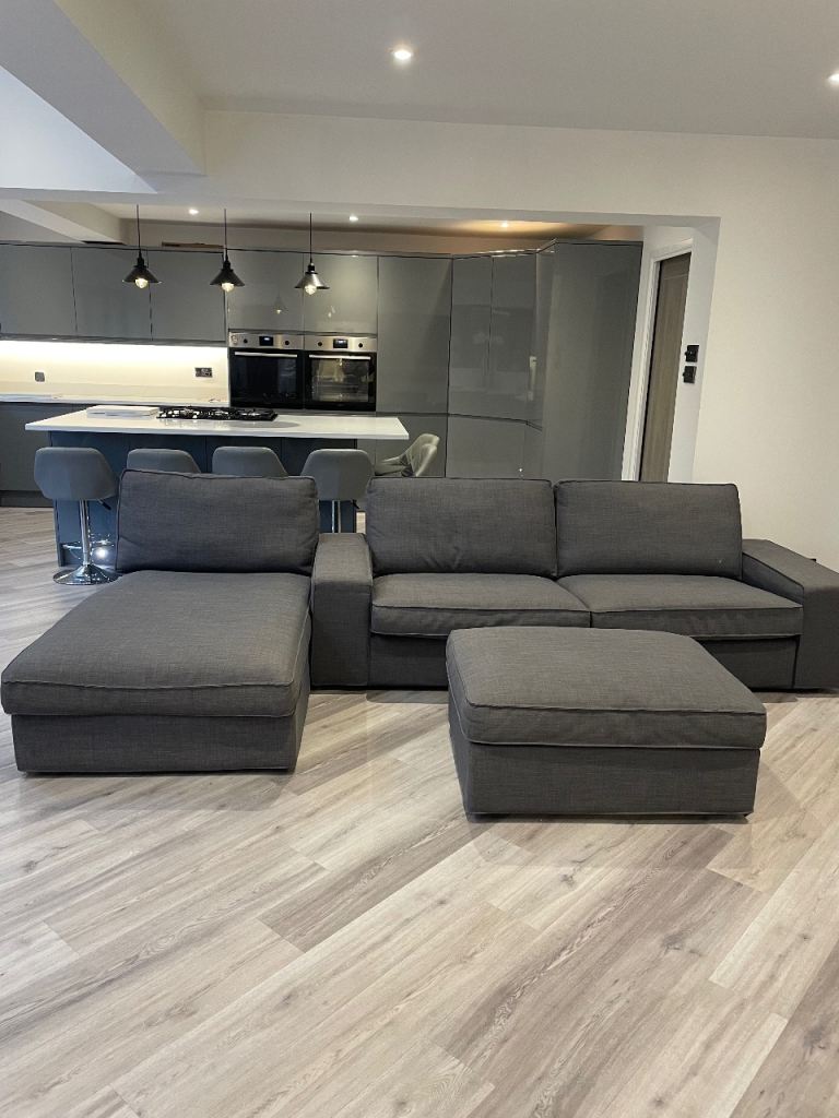 4 seater sofa with chaise and pouffe