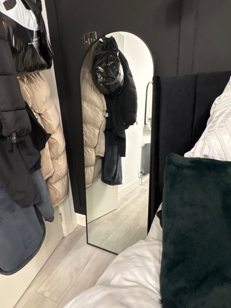 Black habitat arch mirror 