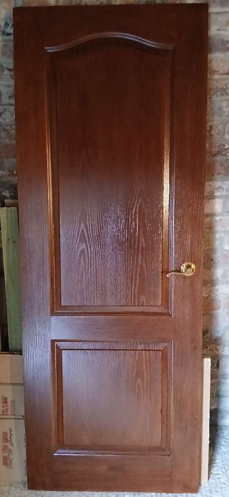 Internal dark wood panelled doors