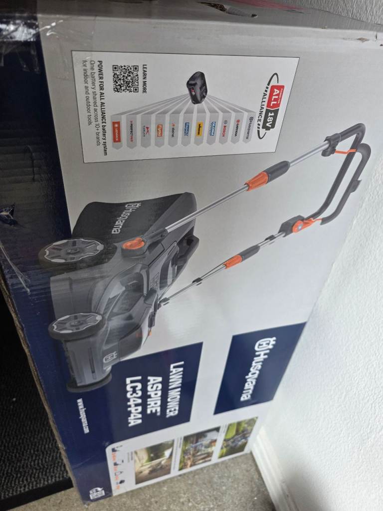 BNIB Cordless lawnmower with 13kg of super seeds