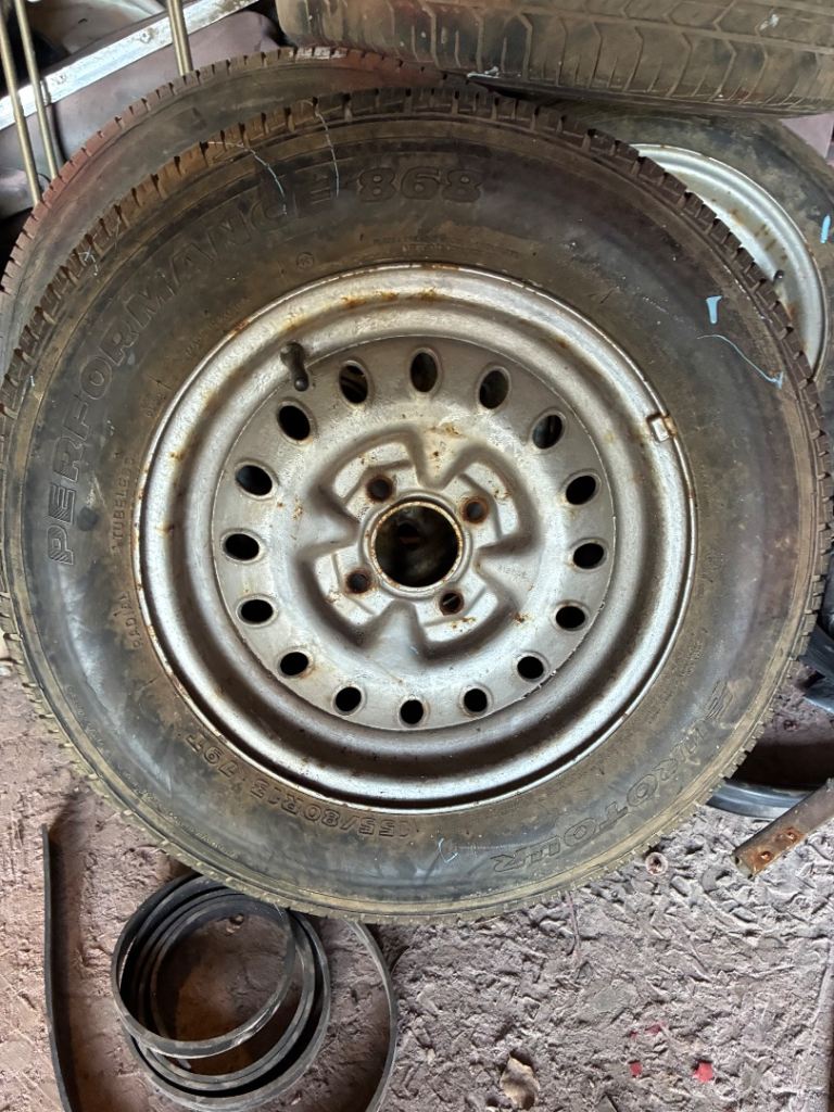 Triumph GT6 factory wheels with tyres