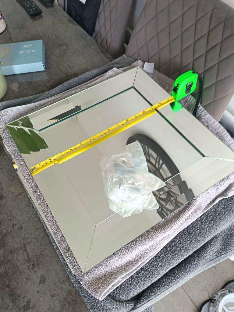 Mirrors with fixings