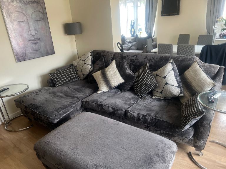 Grey sofa with large foot stall 