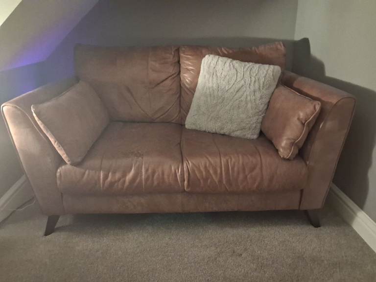 Two x two seater leather sofas