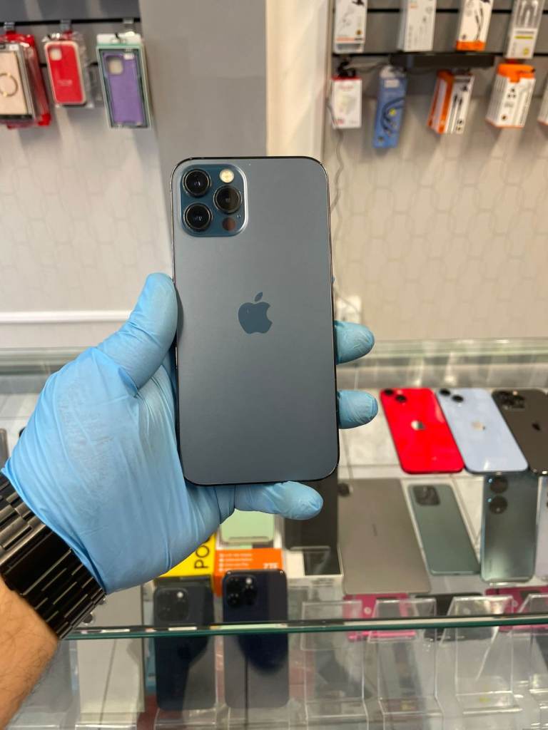 Apple iphone 12 pro 128GB Blue 100% BH ANY SIM Immaculate Condition Manchester M169NF