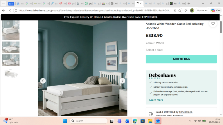 white single bed with second bed stored underneath