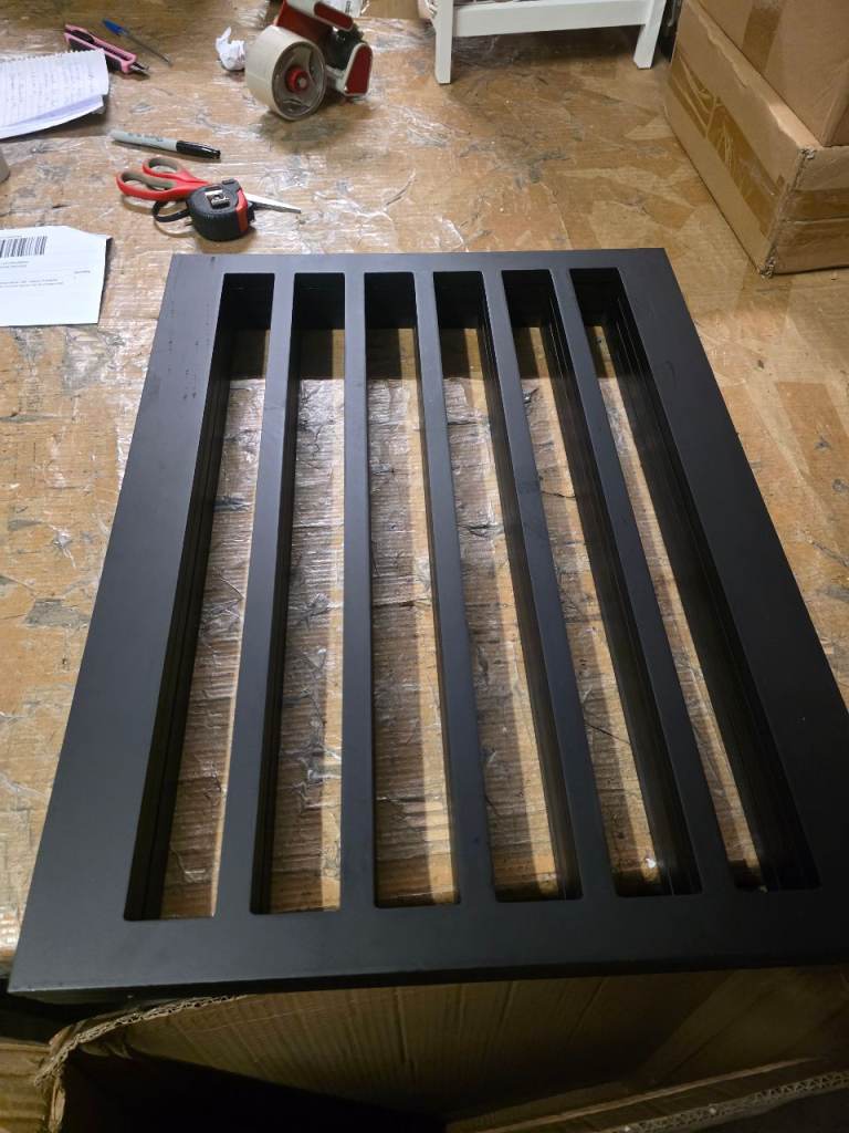 A new still boxed black finish wooden 4 panal folding free standing pet gate. 