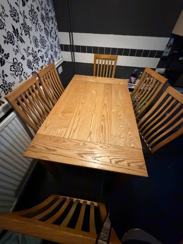 Solid Wood Dining Table with 6 Chairs – Good Condition
