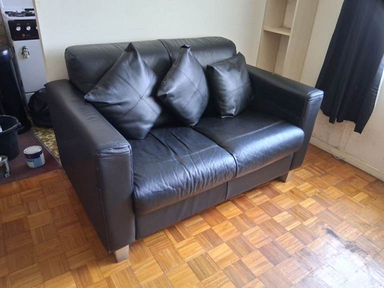 Two seater black sofa