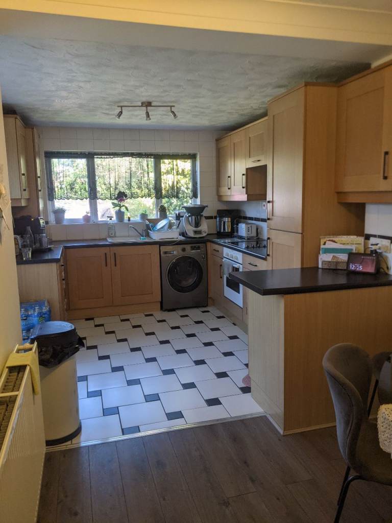 Enfield. 3 Bed end of terrace House with Garage and very large garden.