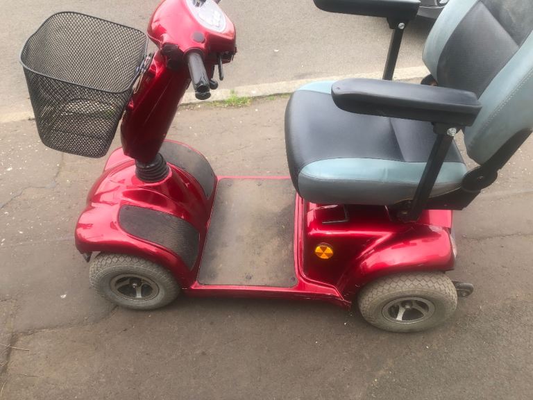 Red Mobility Scooter with Front Basket – Good Condition