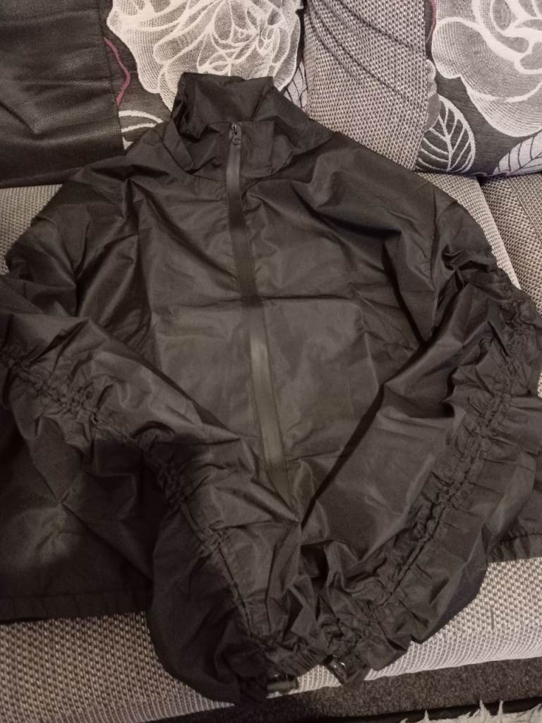Womens rain jacket brand new 
