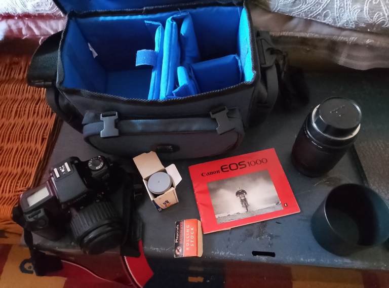 Canon EOS 1000 Camera Kit with  instructions Bag and extra large lense   Lenses