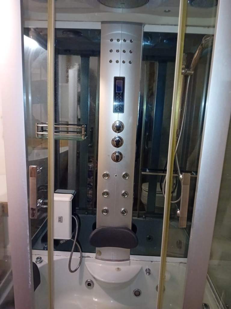 Shower/steam/jacuzzi/small bath/monsoon/jets. Freestanding cubicle