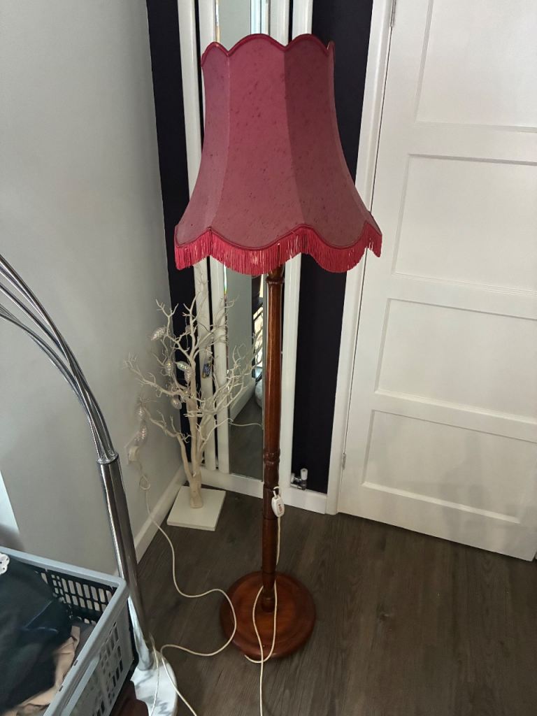 Wooden standard lamp and shade. 