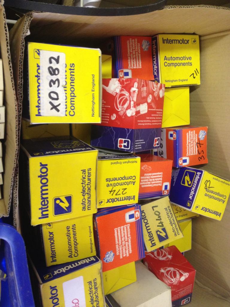 Job lot of points, condensers, relays, distributor housings