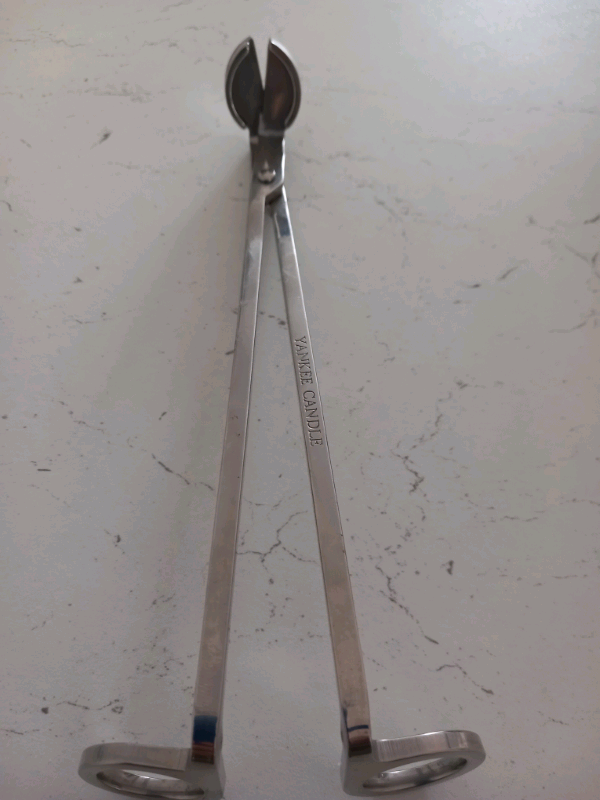 Candal wick cutter