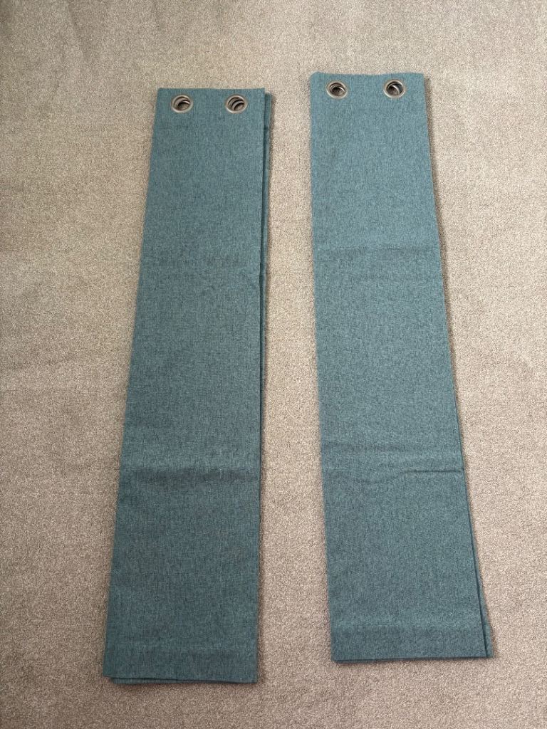 Teal Eyelet curtains with blackout lining