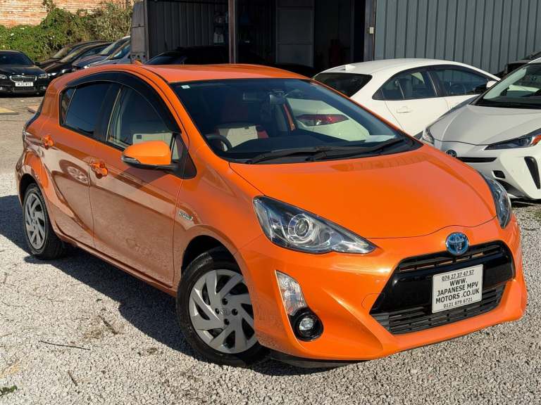 2015 Toyota Aqua S 1.5L PETROL HYBRID AUTOMATIC 5DR HATCHBACK ORANGE 5 SEATER HEATED SEATS  Hatch...