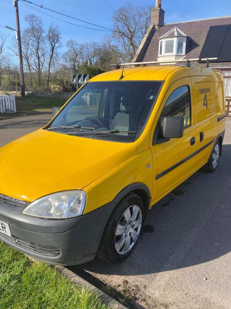 Yellow Vauxhall Combo Van