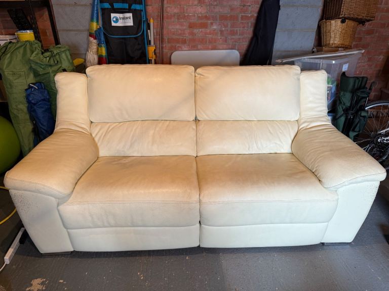 Cream leather recliner sofas x 2