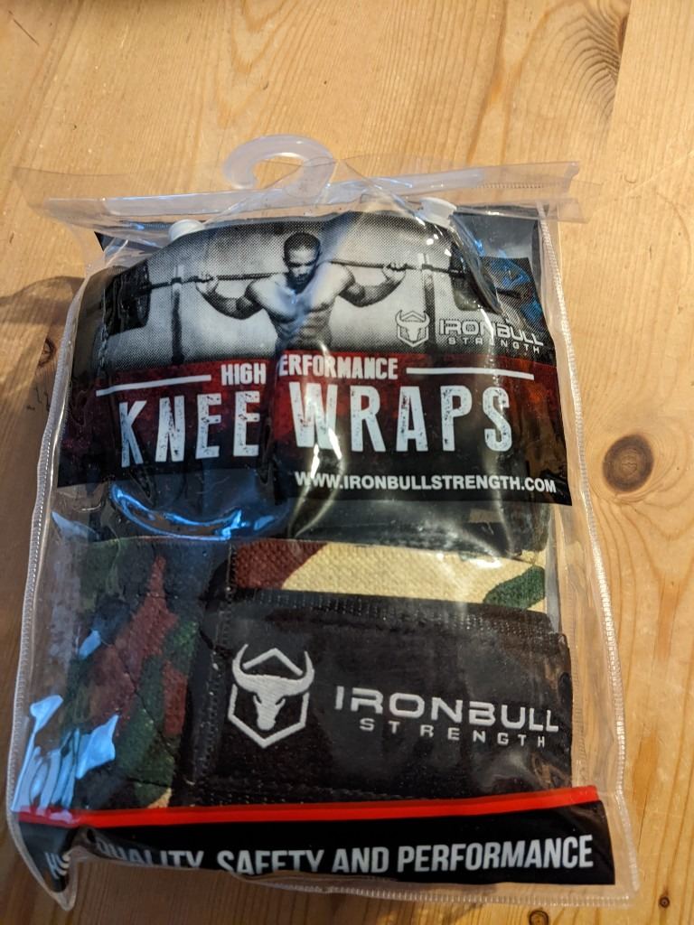 KNEE WRAPS BAND NEW IRON BULL. NEVER USED. CAMMO PATTERN. 