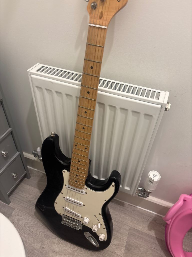 Black Electric Guitar - Good Condition