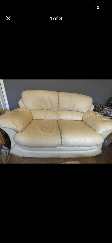 2 x cream leather sofas 