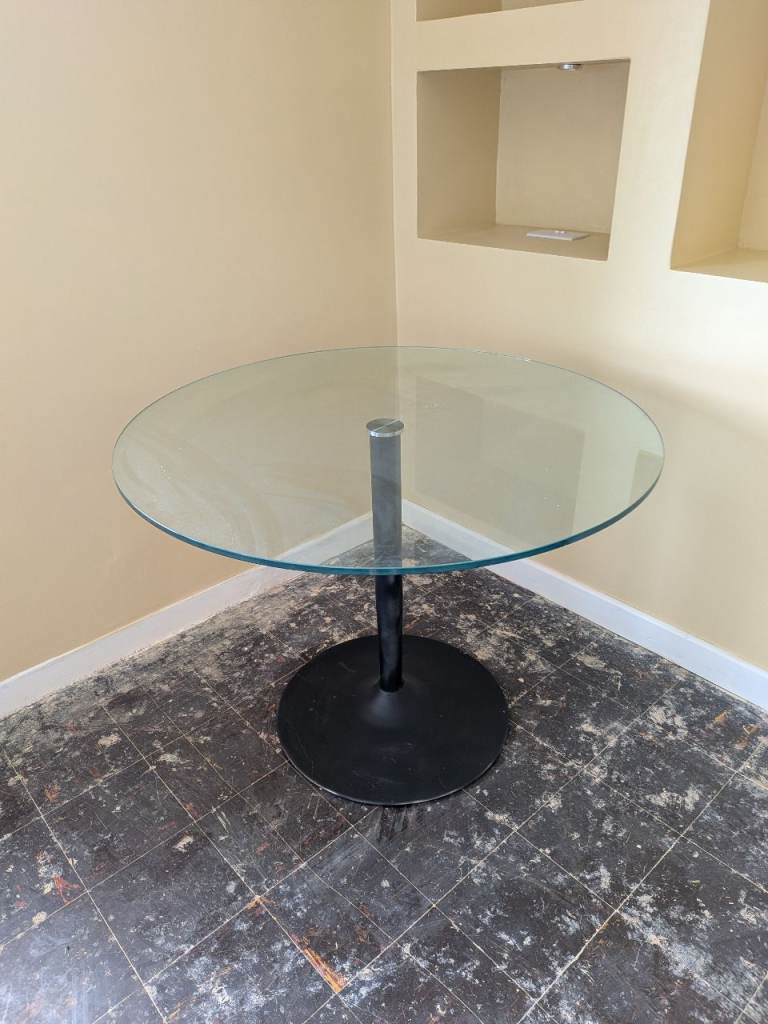 Round Glass Dining Table with Black Pedestal Base
