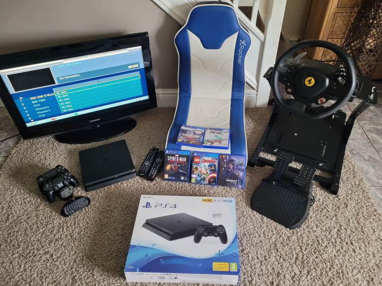 PS4, steering wheel, tv, games and chair