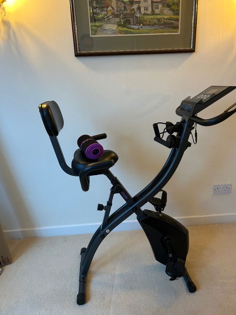 Exercise Bike with upper body exercise bands