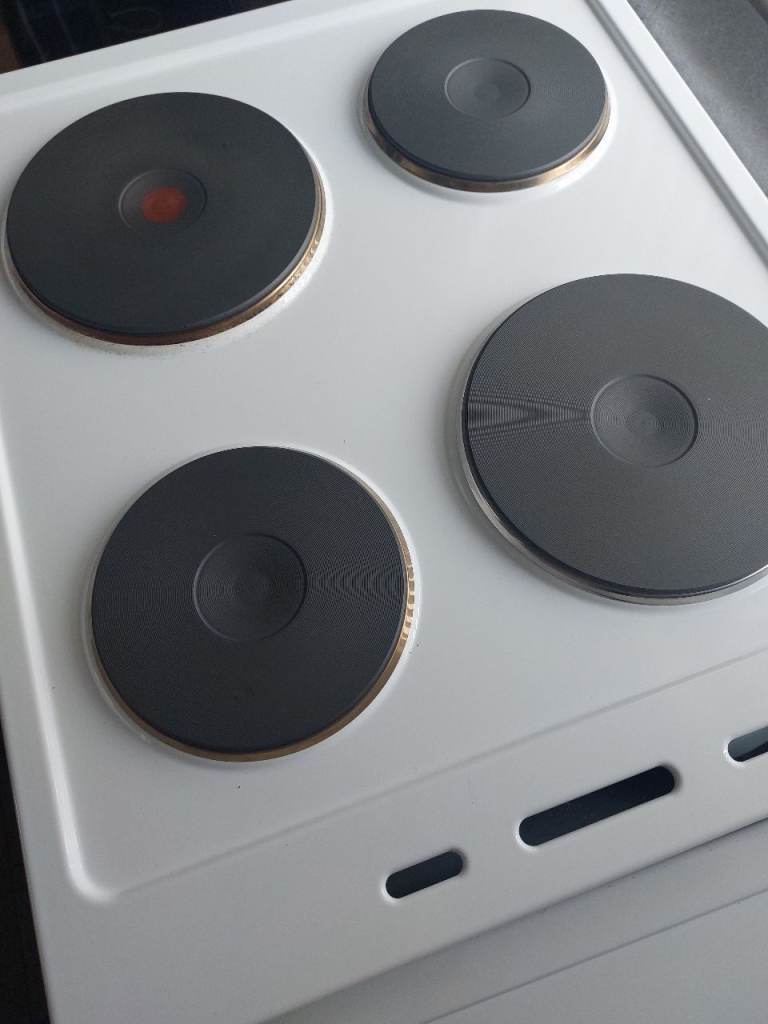 electric cooker in white and black glass 50cm current model in shops as new and perfect