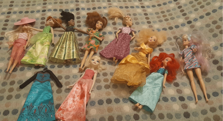 Nine Barbie dolls