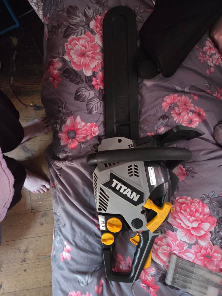 TITAN Electric Chainsaw – Good Working Condition