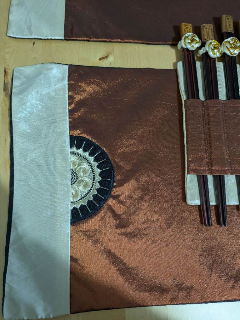 New Chinese placemats and chopsticks x 6 settings bronze colour 