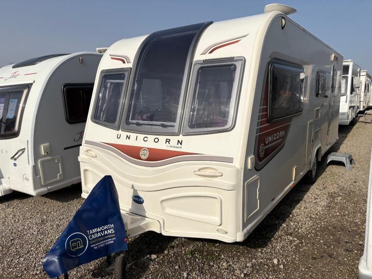 BAILEY UNICORN MADRID - 4 BERTH CARAVAN WITH END WASHROOM + MOTORMOVER