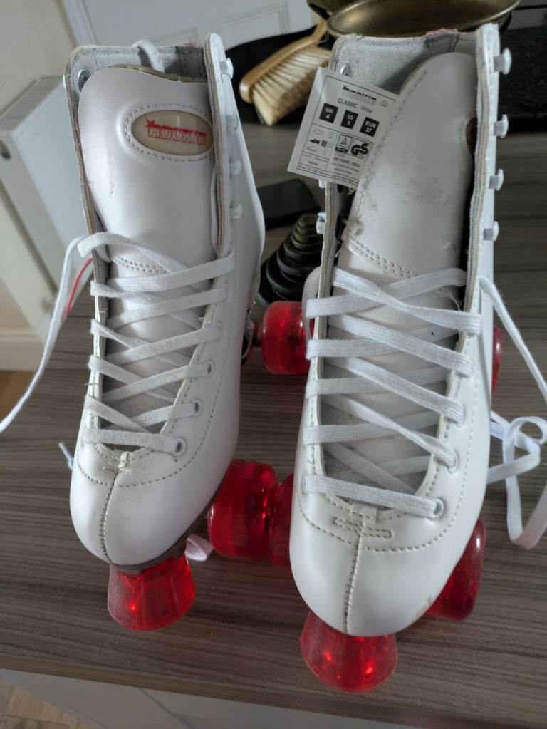 Lovely Rookie roller skates, hardly used. Size 4 adult 