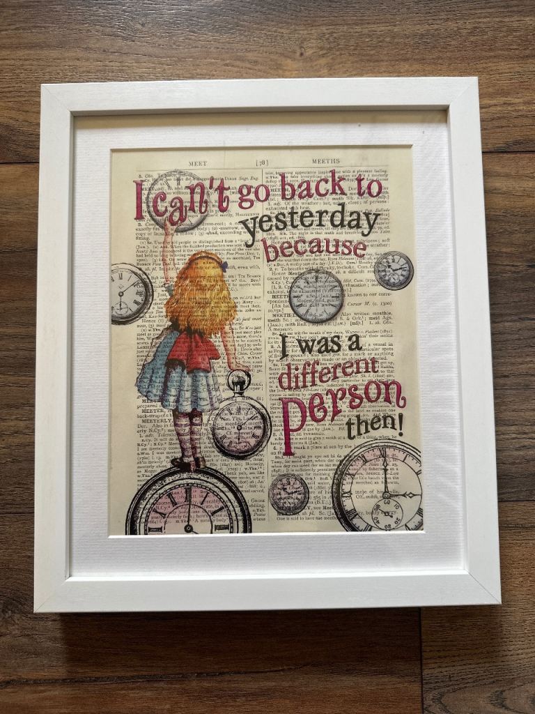 Alice in Wonderland quote overlaid on dictionary page