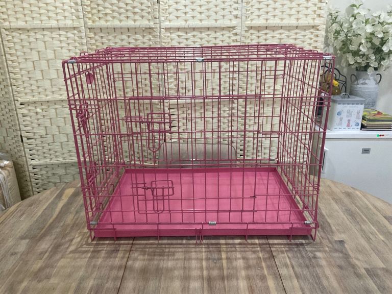 Pink dog crate