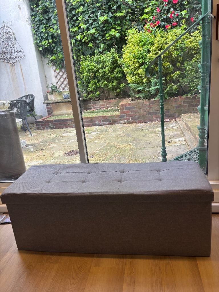 Grey fabric ottoman storage box 