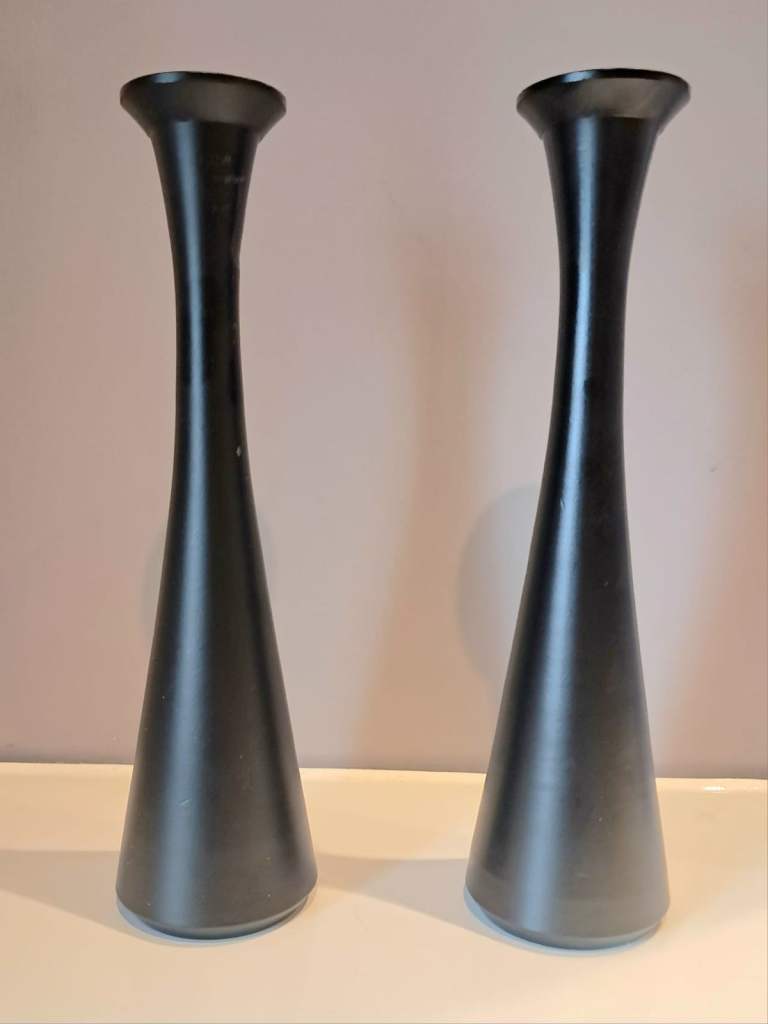 Pair of decorative ceramic vases in a compelling tapered flute design