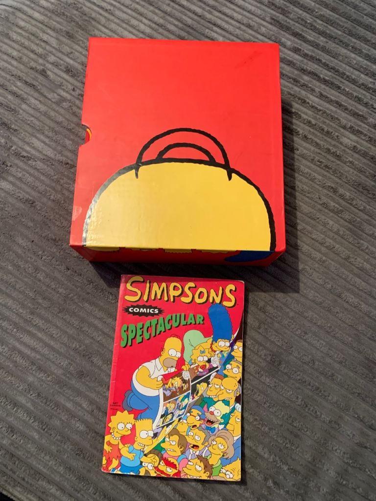 The Simpsons world hardback book 