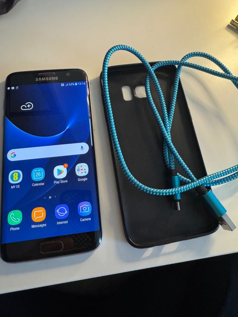 Samsung Galaxy S7 edge black with phone case and cable SM-G935F 32GB (Unlocked)