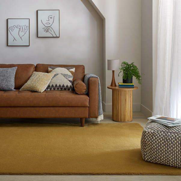 Dunelm mustard yellow soft rug 