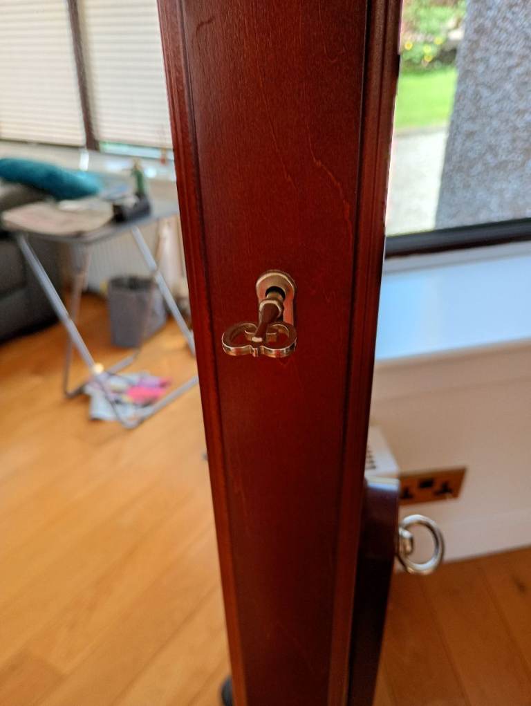 A Free Standing mirrored Jewellery cabinet by Lorie Grenier 