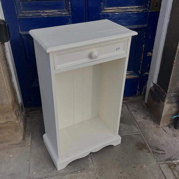 Lovely vintage pine storage unit, hand-painted white.
